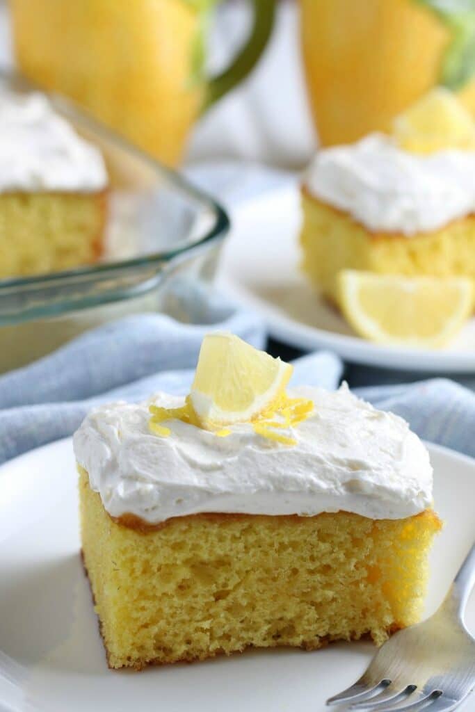Lemon Poke Cake with Whipped Lemon Frosting To Simply Inspire