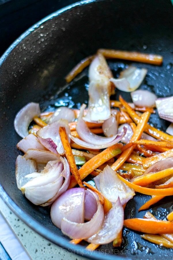Kung Pao Tofu onions carrots cooking