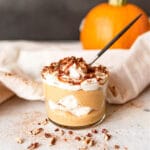 Single serve pumpkin cheesecake trifle with a spoon