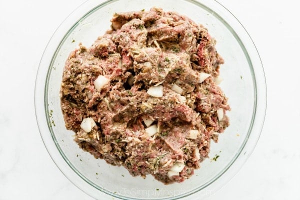 Meatloaf mixture in a glass bowl