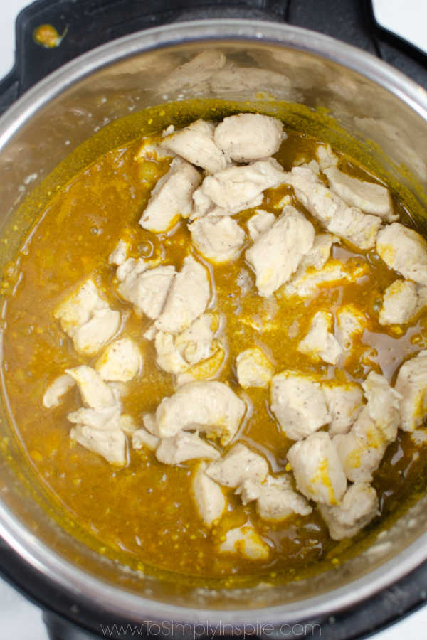cooked diced chicken in a curry sauce in an Instant Pot