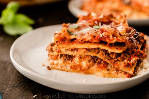 slice of lasagna on a white plate