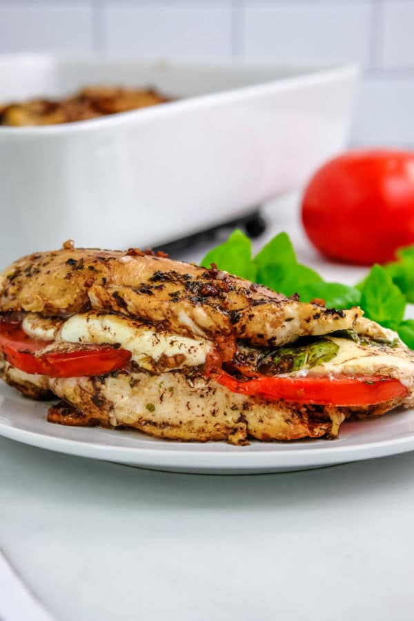 chicken breast stuffed with tomato slice, fresh mozzarella and fresh basil