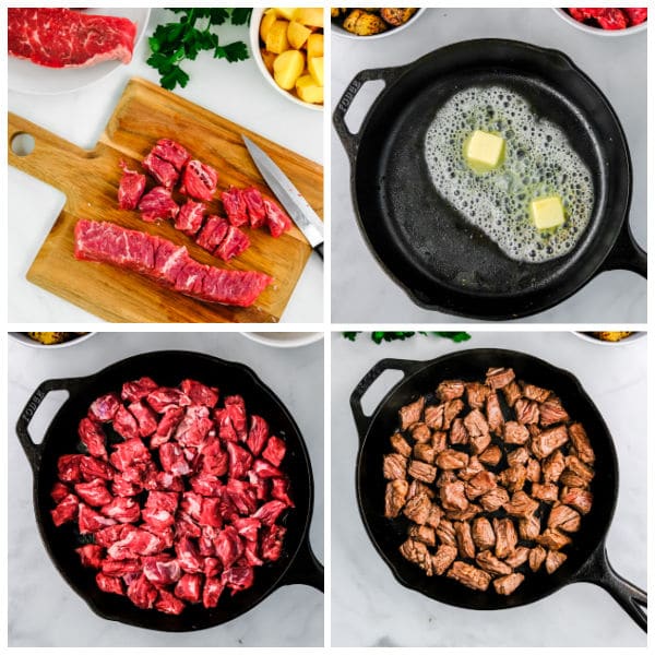 Butter Steak Bites cooking in a cast iron pan