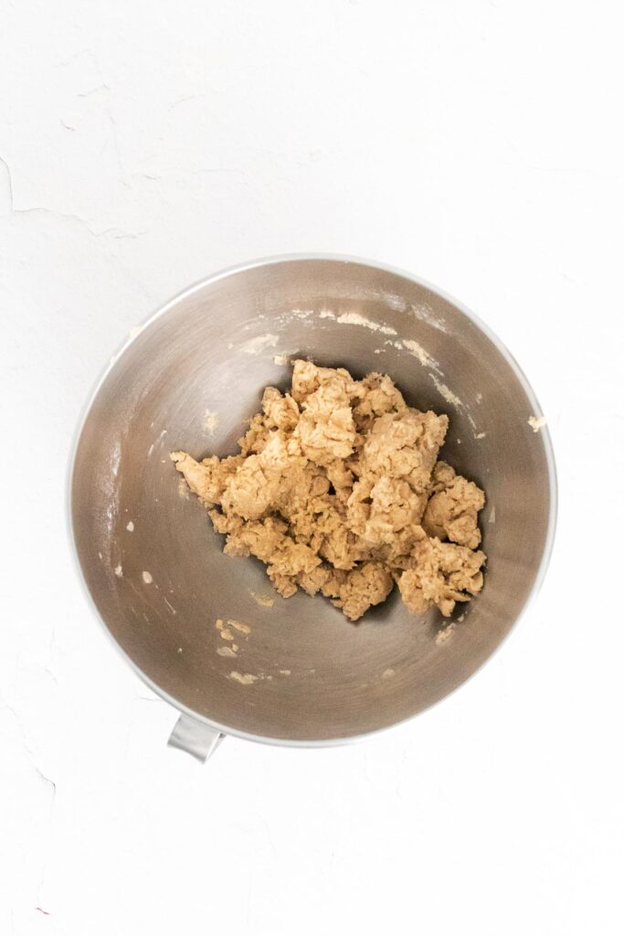 shortbread dough in a silver bowl