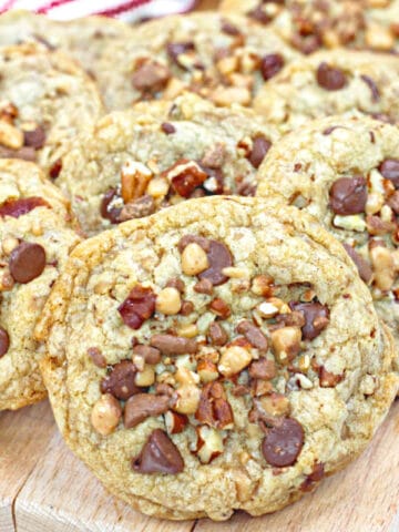 toffee chocolate chip cookies with pecans on top