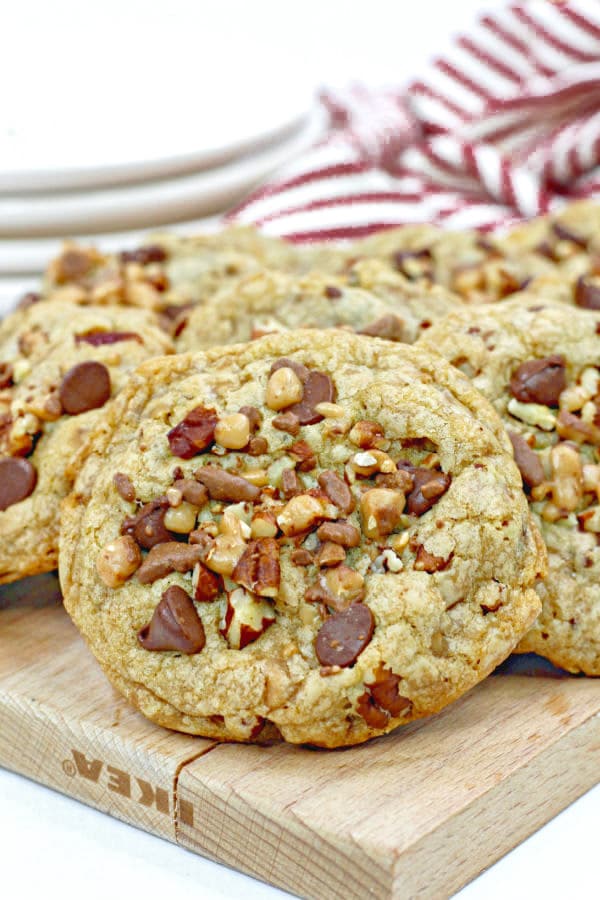 several chocolate chip toffee cookies on a cutting board