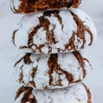 a stack of four chocolate crinkle cookies with text overlay