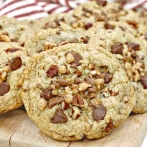 toffee chocolate chip cookies on a wood cutting board