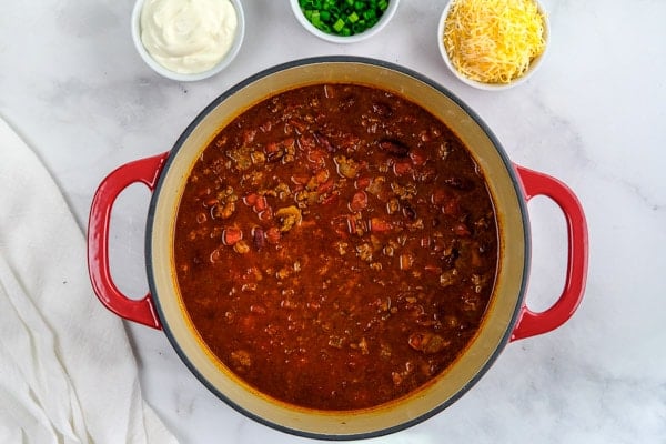 classic ground beef chili in a dutch oven 