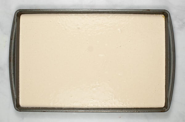 pancake batter in a baking sheet