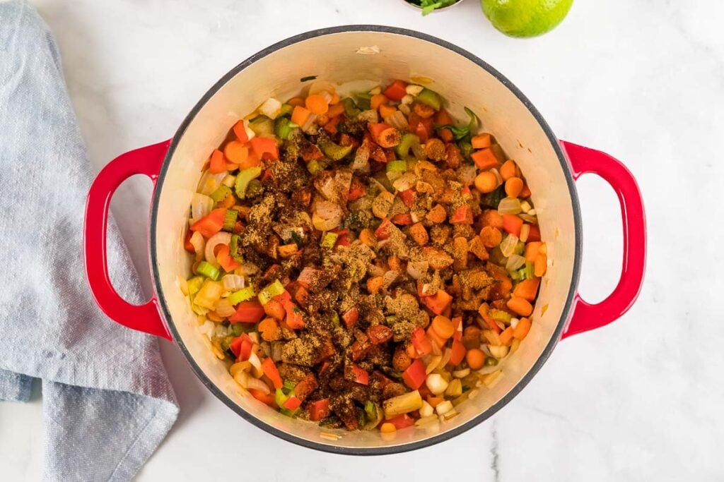 ingredients for black bean soup in a dutch oven