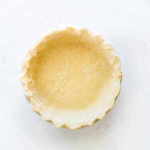 uncooked pie crust in a pie plate
