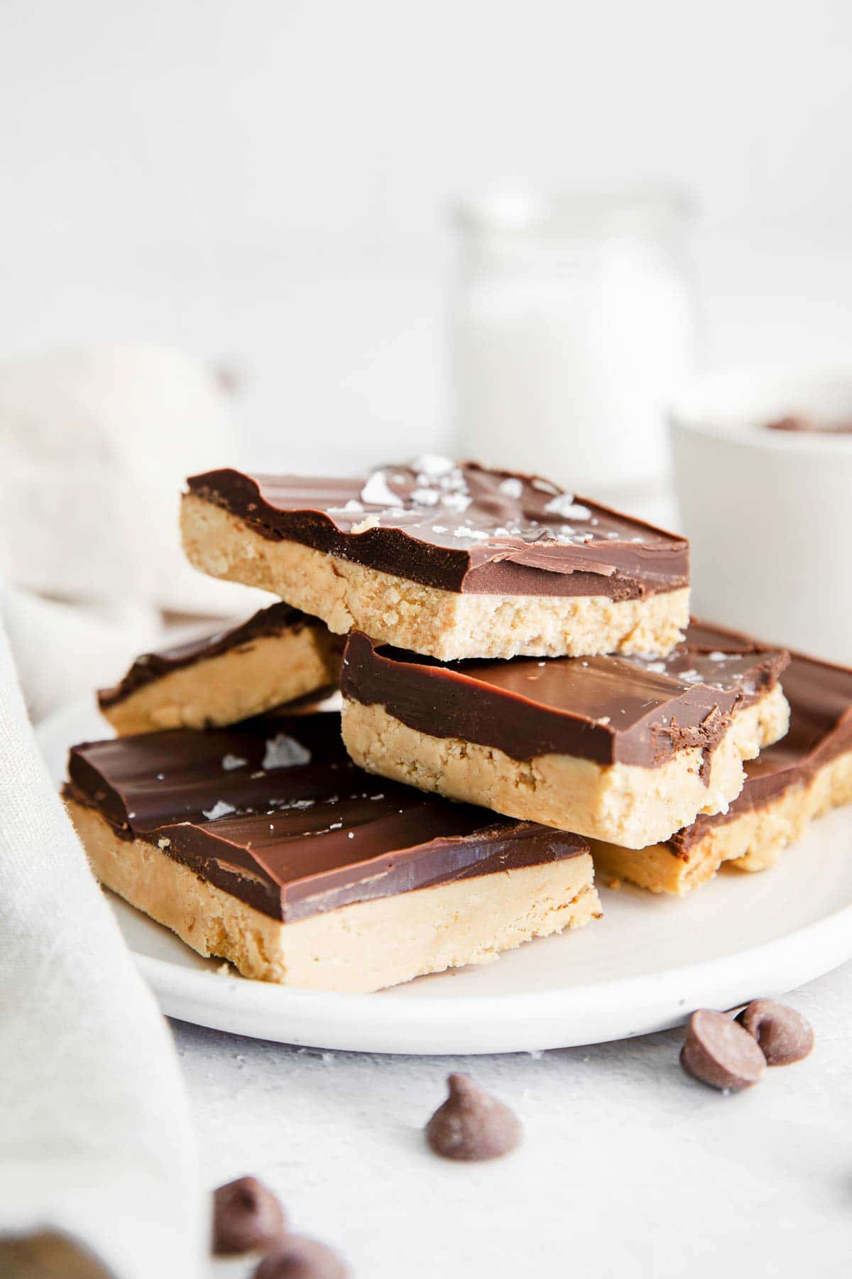 stack of peanut butter and chocolate buckeye bars on a plate