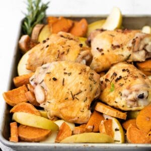 sheet pan with chicken thighs, sweet potato and apple slices