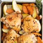 sheet pan chicken thighs with sweet potatoes and apples with text overlay