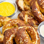 plate full of homemade pretzels with salt