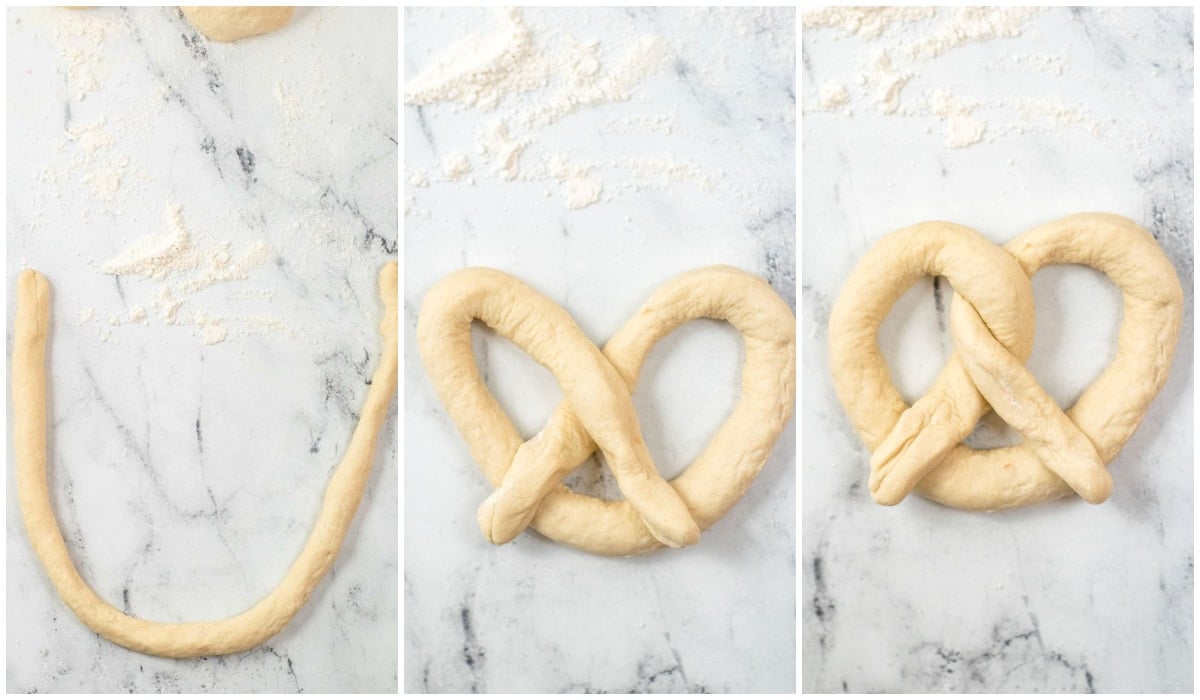 rolled out dough being shaped into a pretzel knot
