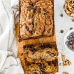 closeup of chocolate chip zucchini bread with two slices cut off