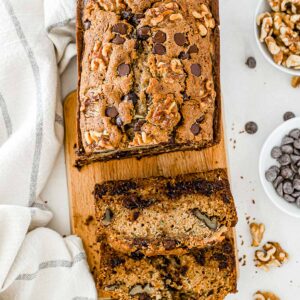 closeup of chocolate chip zucchini bread with two slices cut off