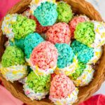 wood basket filled with egg shaped easter rice krispie treats