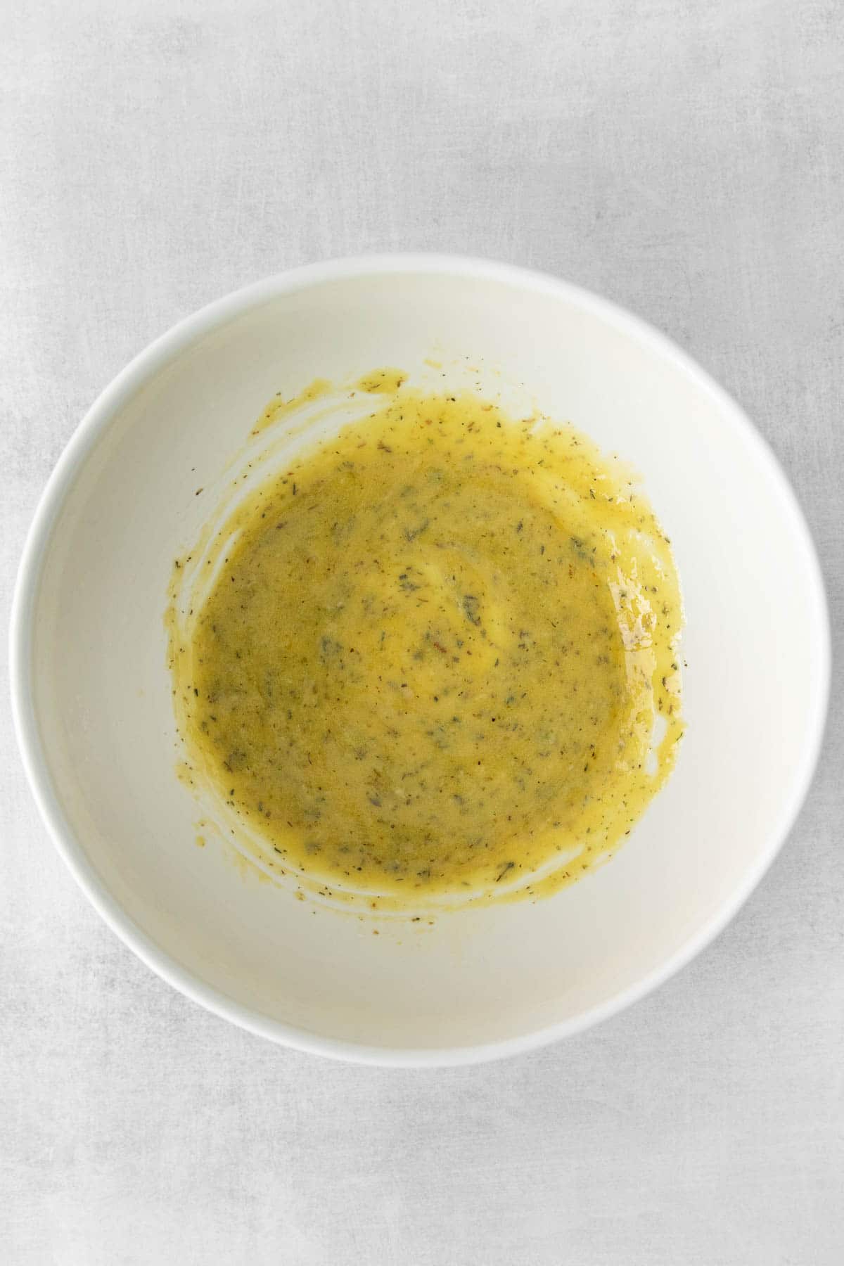 white bowl with mustard vinaigrette
