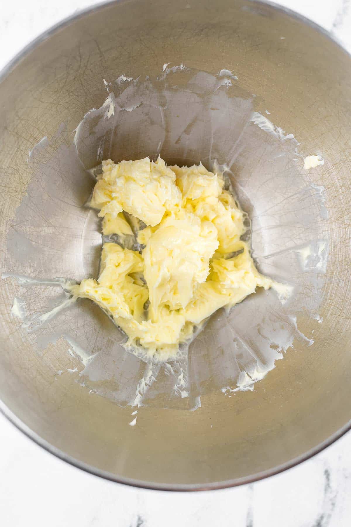 softened butter in a big silver mixing bowl.