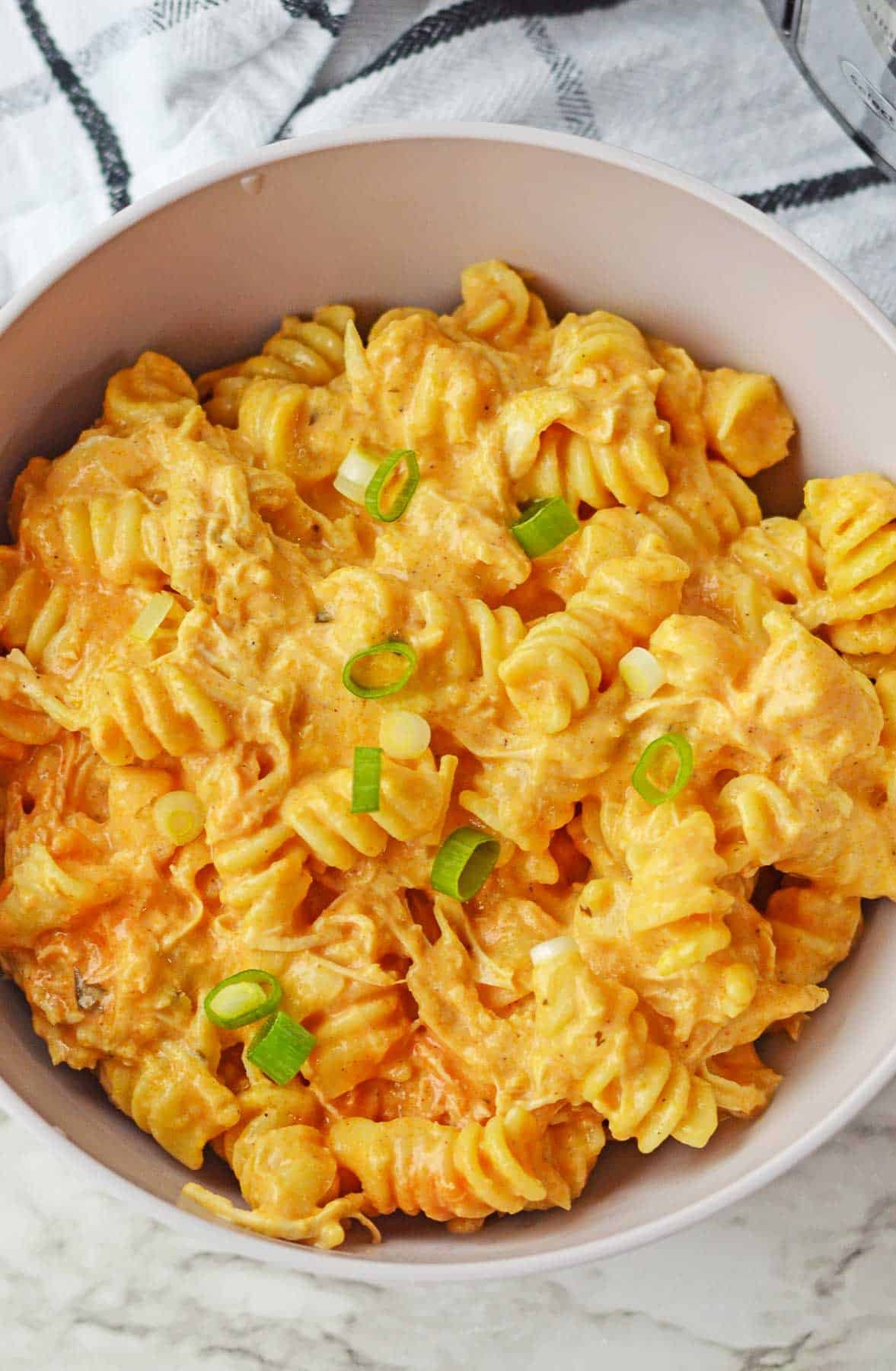 closeup of a bowl full of buffalo chicken macaroni and cheese.