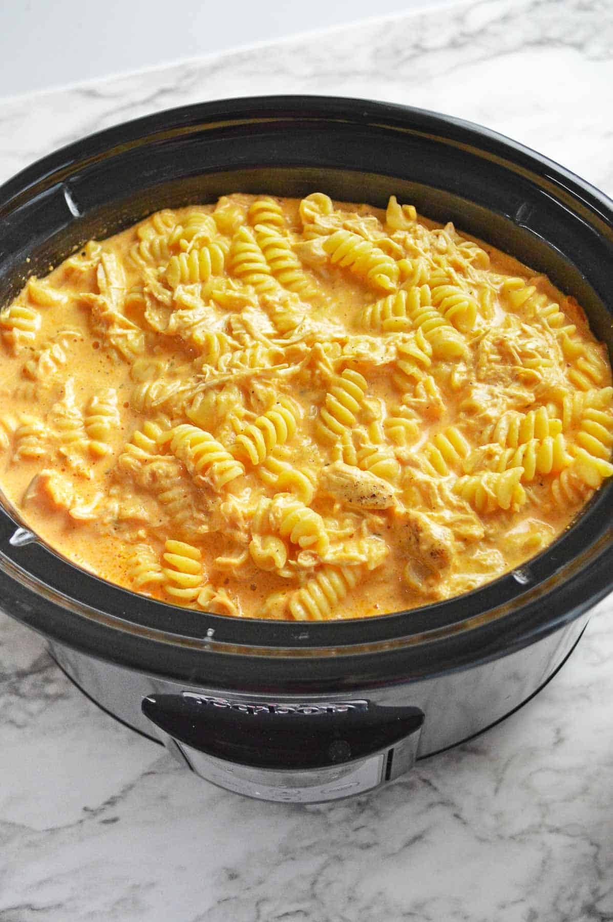 buffalo chicken macaroni and cheese in a slow cooker.