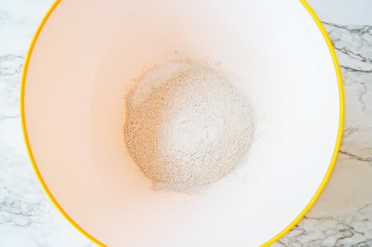 white mixing bowl with instant pudding mix.