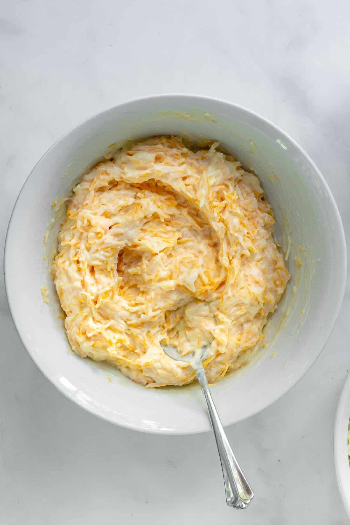 white bowl with creamy cheese mixture.