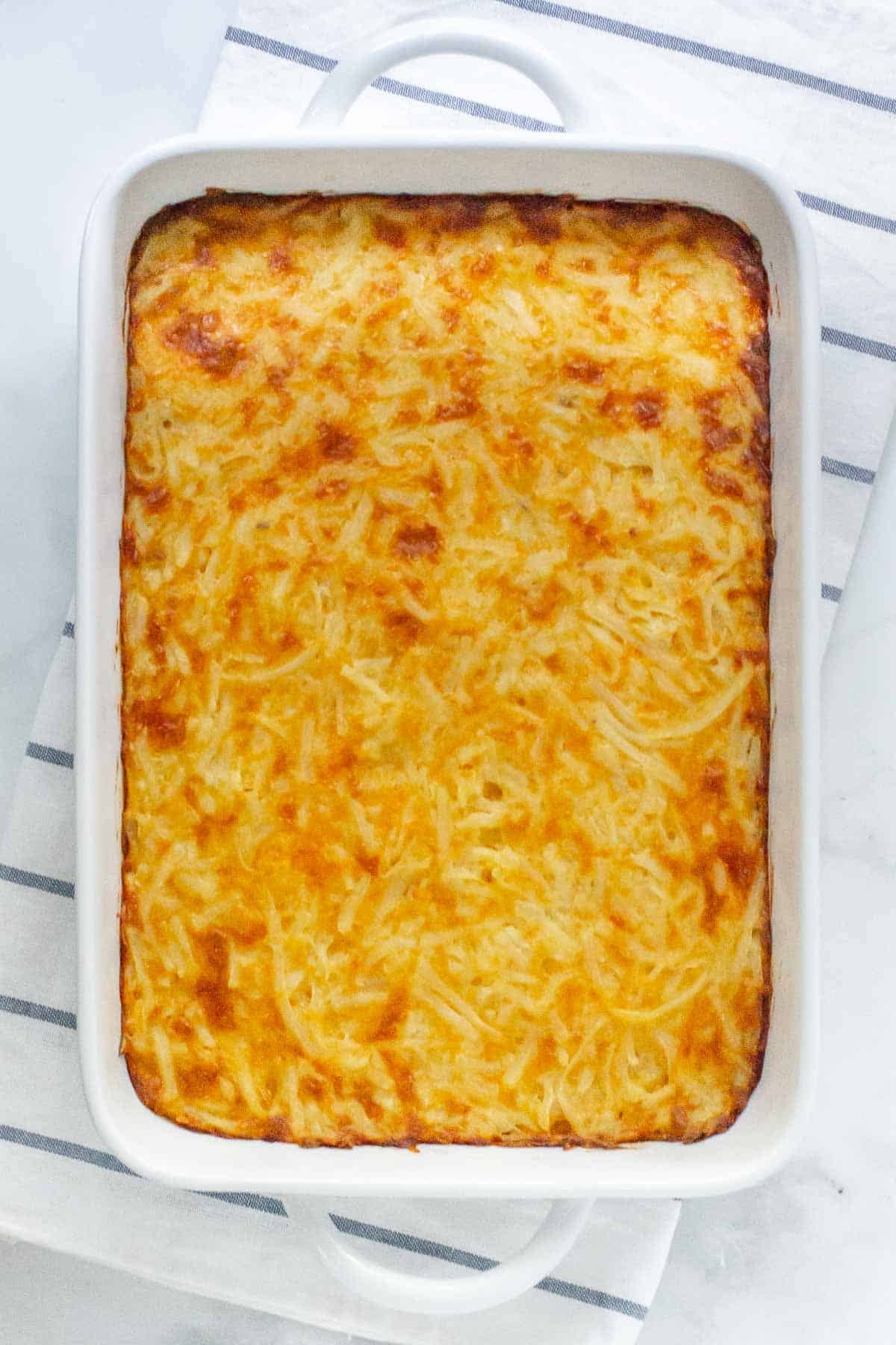 rectangle casserole dish with baked hashbrown casserole.