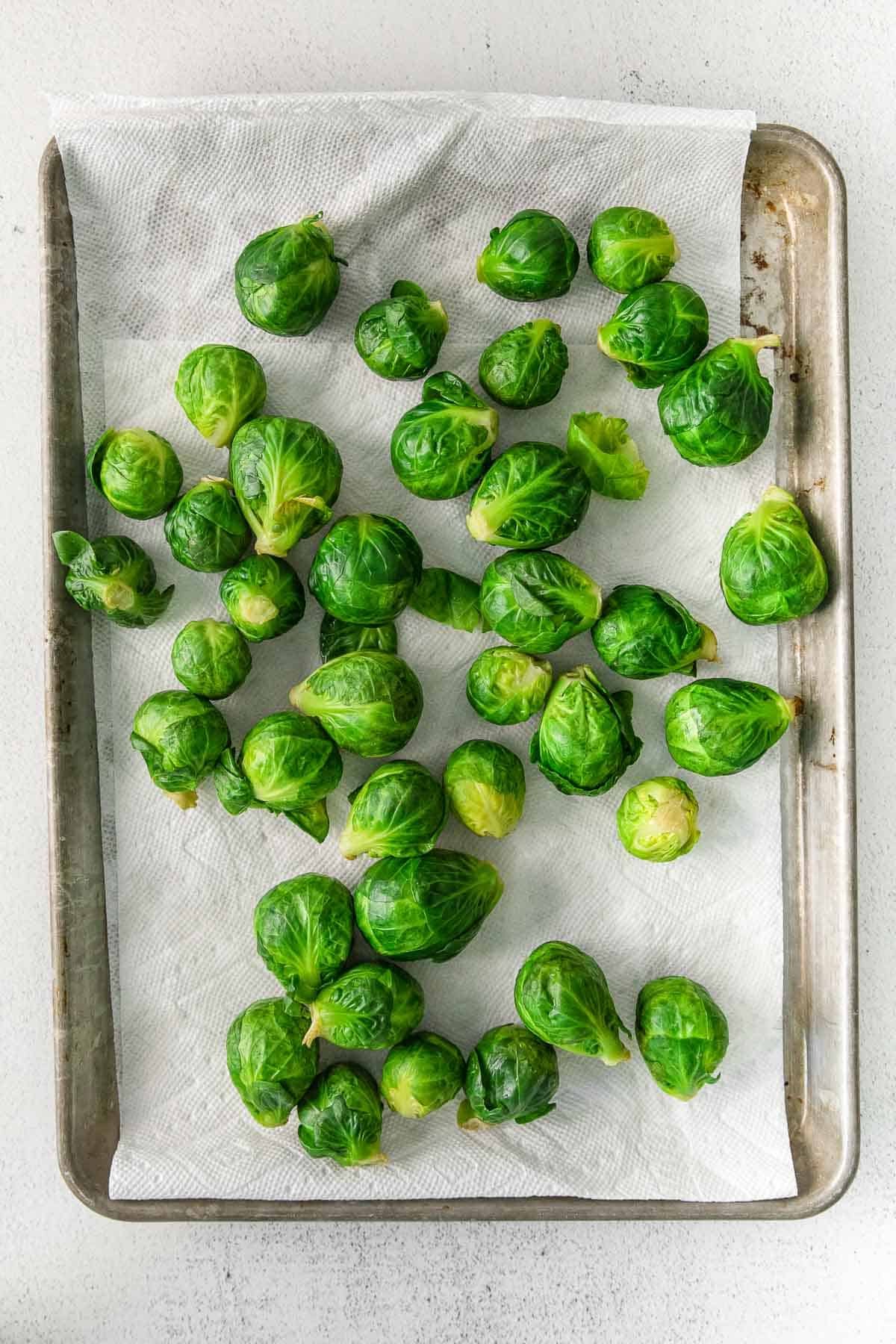 baking sheet full of brussel sprouts.
