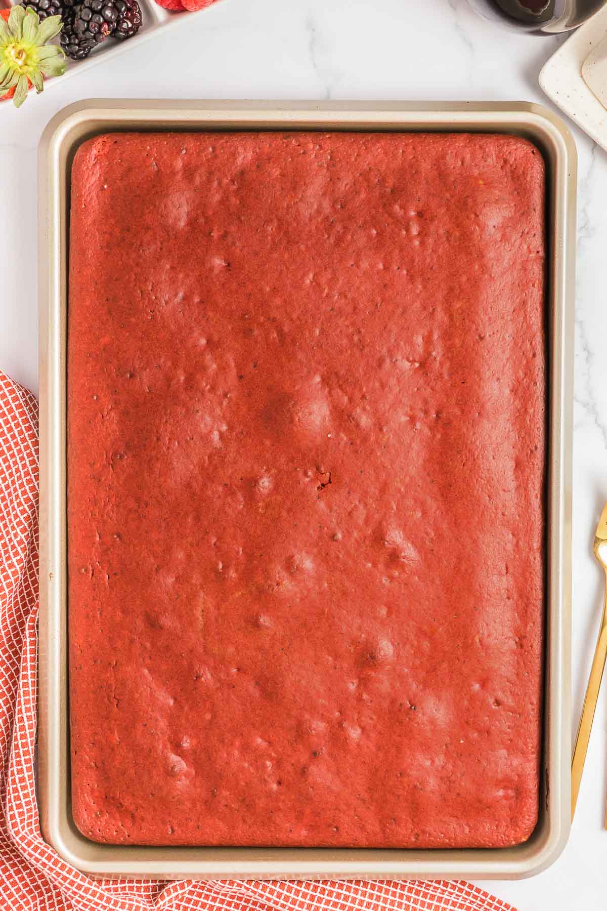 Sheet pan full of baked red velvet pancakes.