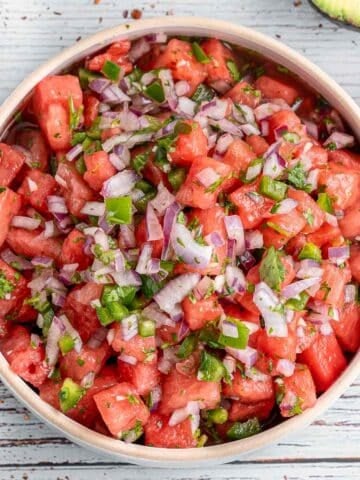 White bowl of watermelon salsa.