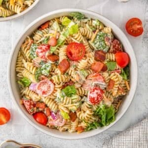 BLT pasta salad in a white bowl.