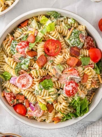 BLT pasta salad in a white bowl.