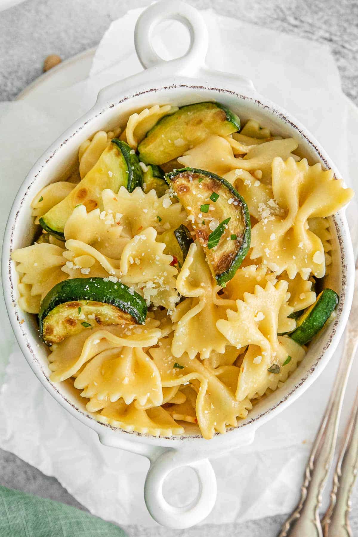 Lemon Zucchini pasta in small white bowl.