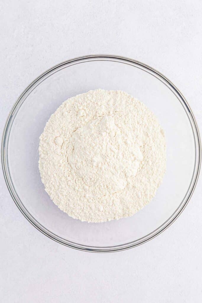 glass mixing bowl of flour.