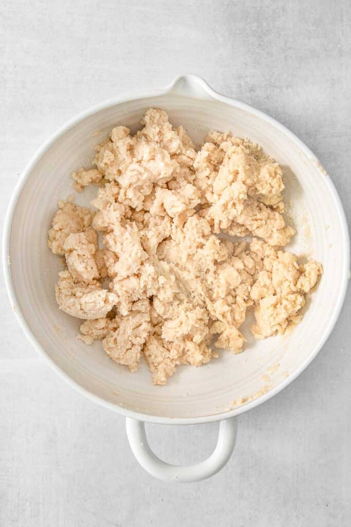 Cobbler topping in large white mixing bowl.