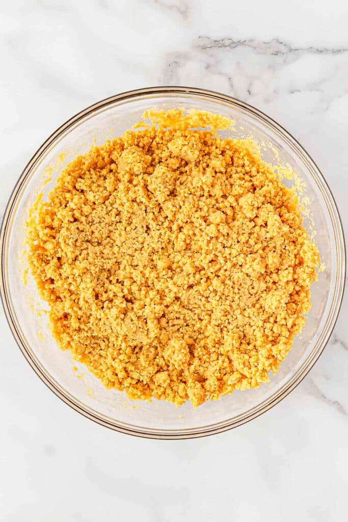 Golden oreo breadcrumbs in mixing bowl.