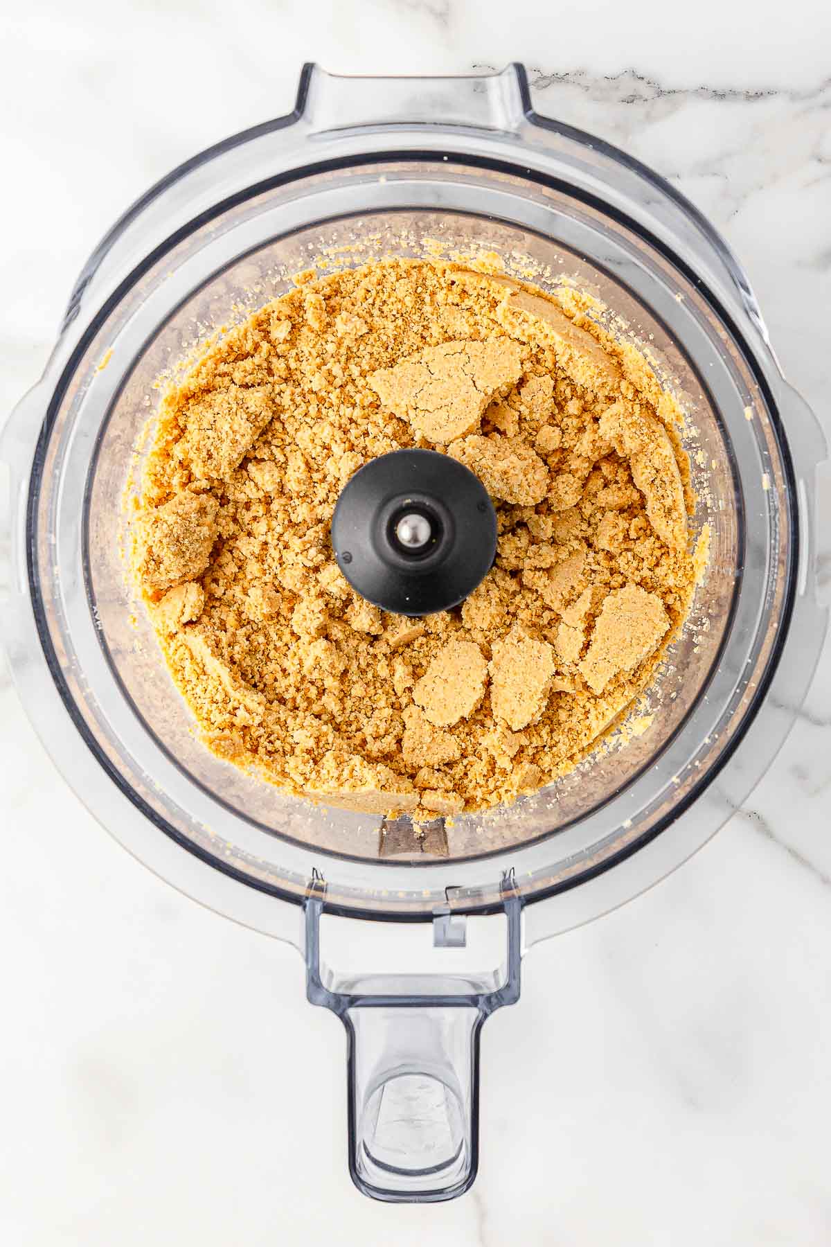 Golden oreos crumbled up in food processor.