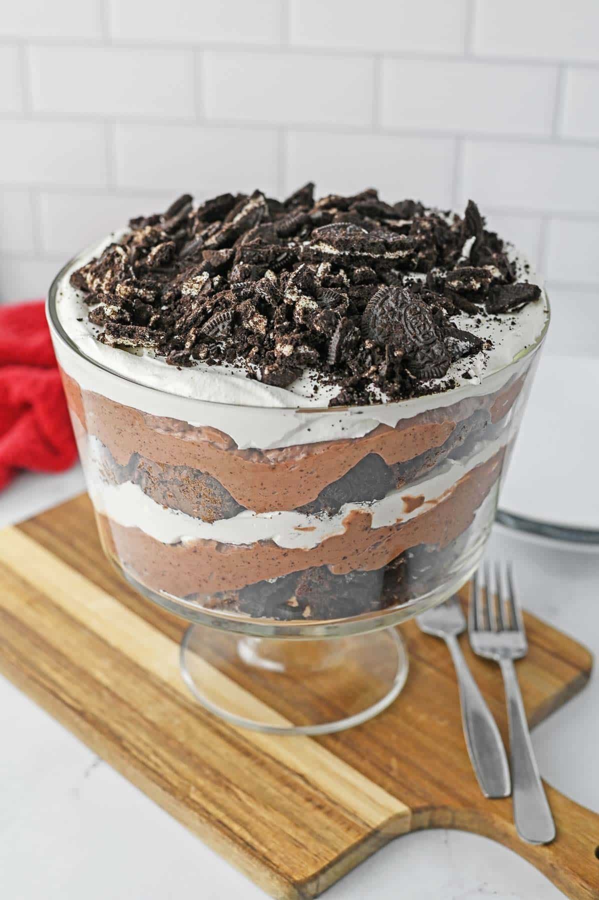 Brownie trifle in a glass trifle bowl.