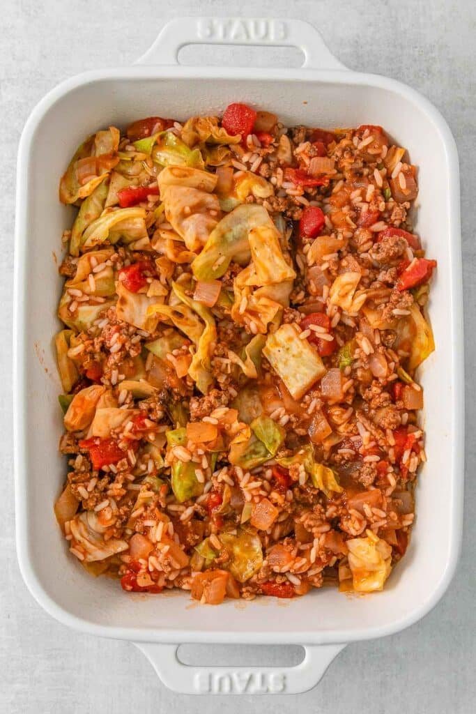 Cabbage mix in a white baking dish.