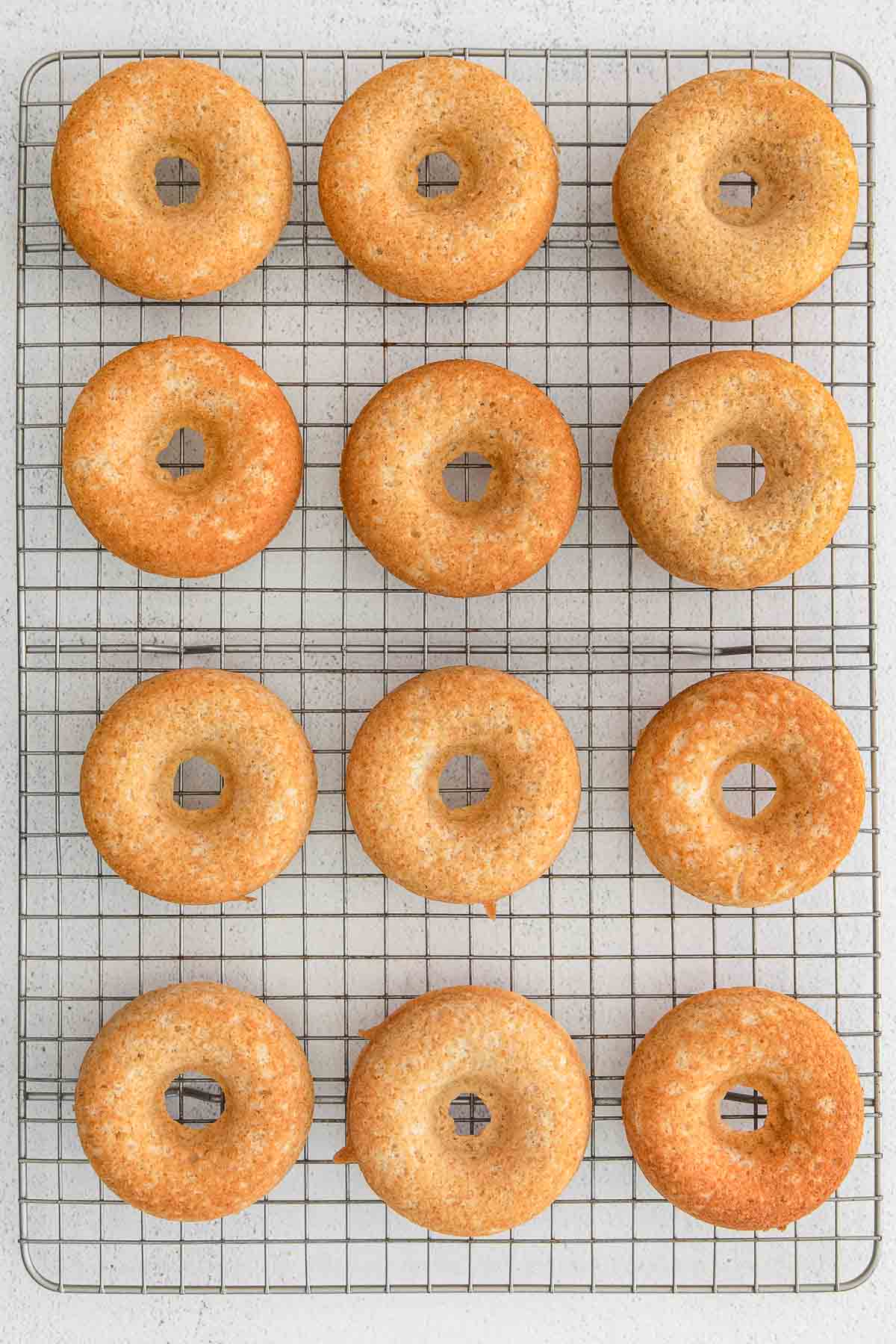 Donuts on a wire cooling rack.