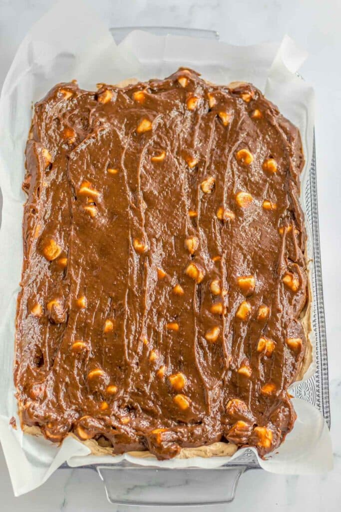 a rectangle baking dish with chocolate pudding with mini marshmallows.