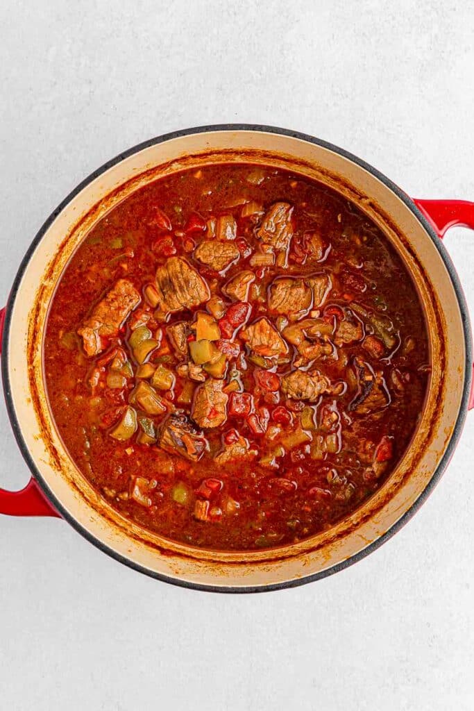 A pot of stew with meat and vegetables in it.