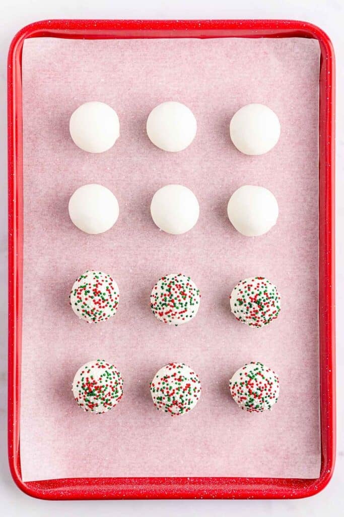A tray of sugar cookie truffles with sprinkles on top.
