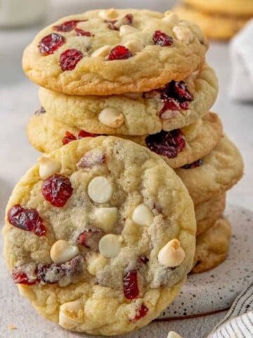 A stack of white chocolate cranberry cookies.