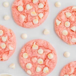 Strawberry cookies with white chocolate chips spread throughout.